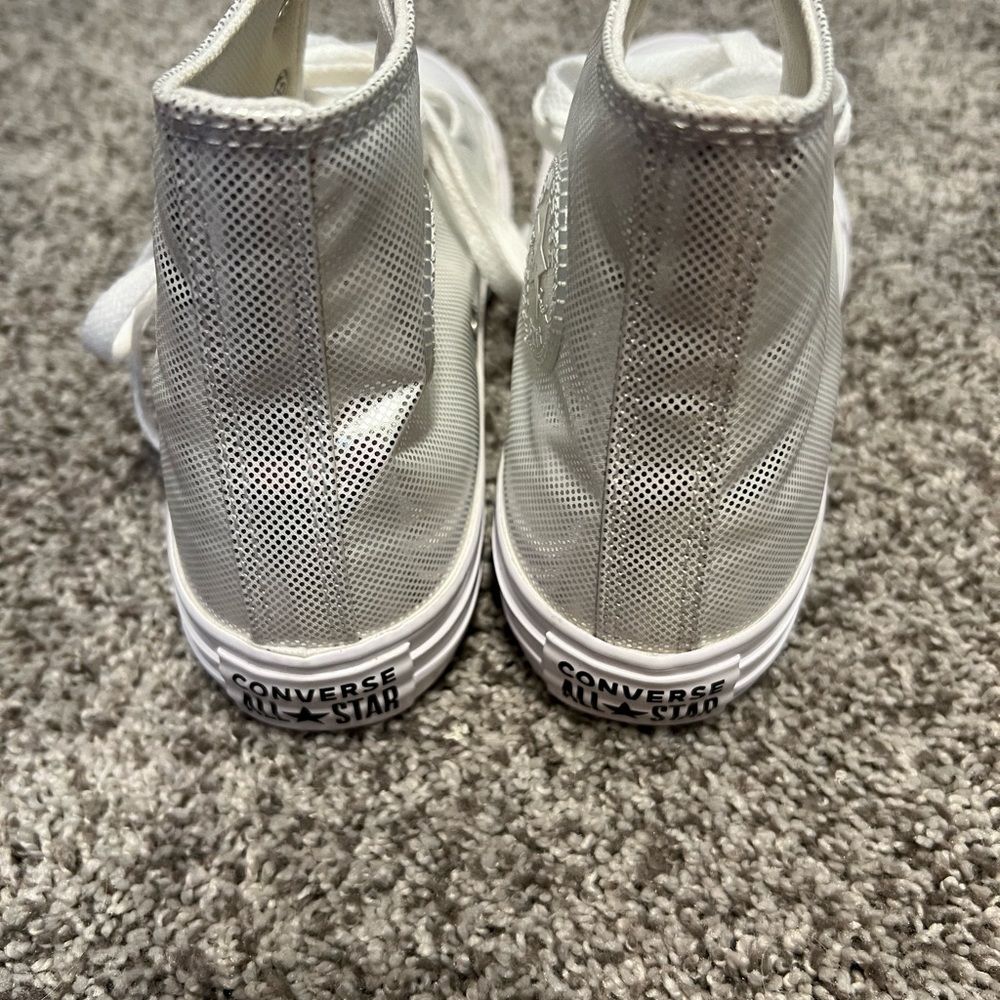 Converse silver  metallic high top tennis shoes